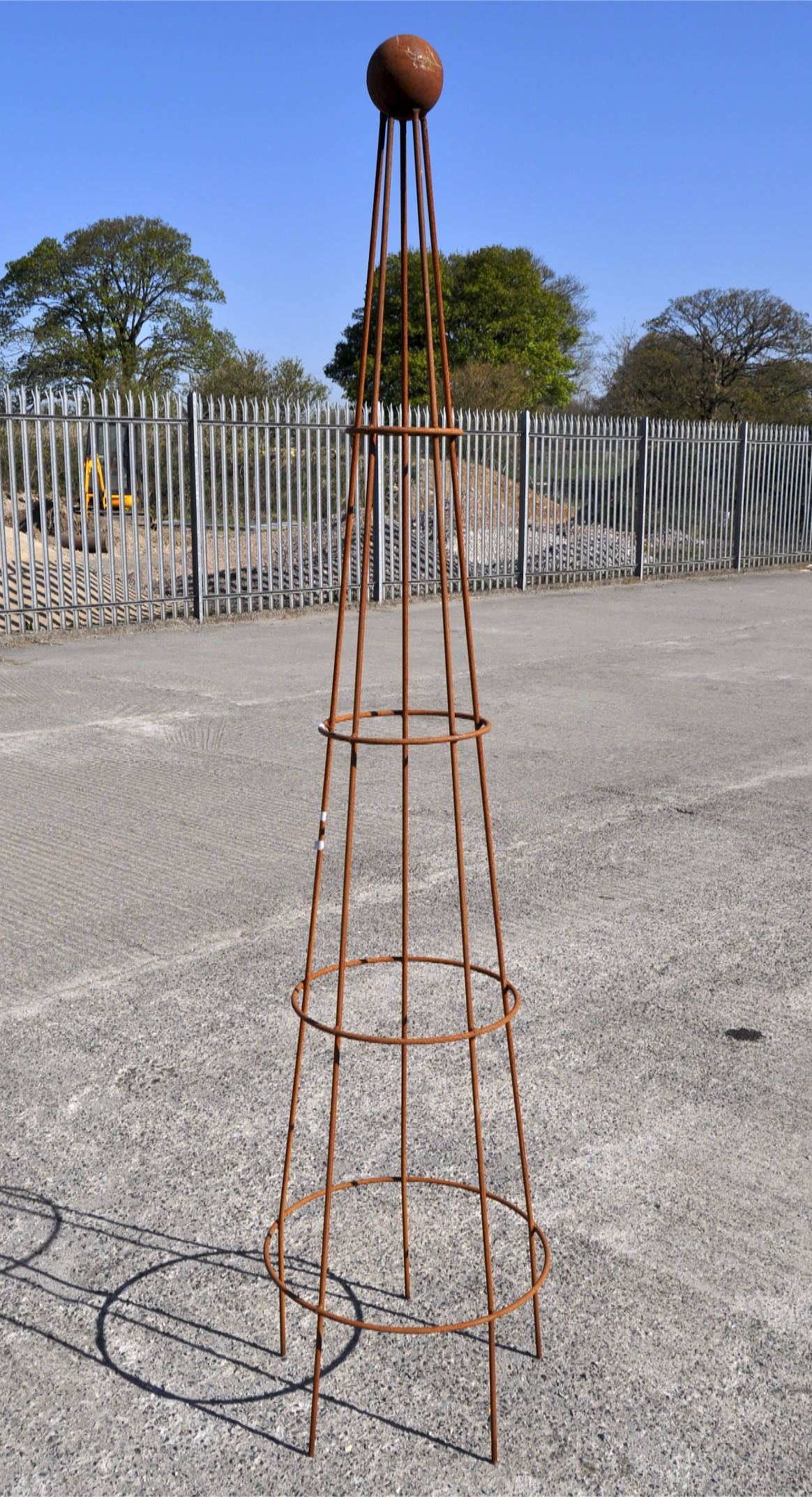 A large garden metal obelisk,