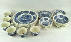 A blue and white teaset titled "Fair Winds" by Alfred Meakin, including teacups, plates,