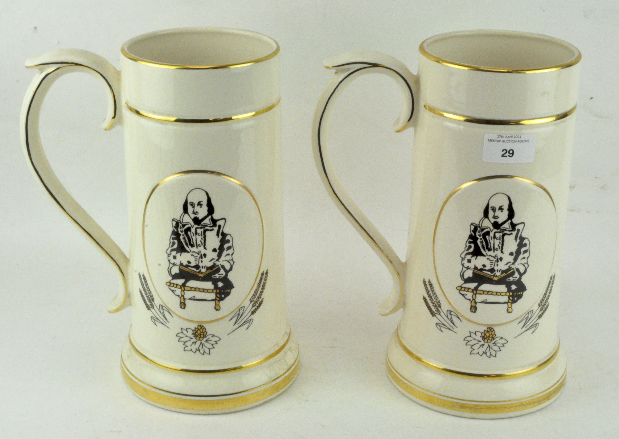 A pair of Prinknash pottery tankards, printed black marks,