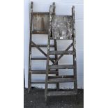 Two pairs of wooden step ladders,