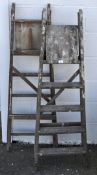 Two pairs of wooden step ladders,