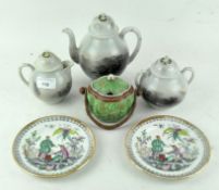 An early 20th century Japanese teapot, milk pot and lidded sugar bowl,