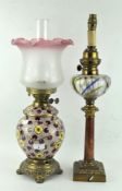 Two oil lamps, one by Duplex,