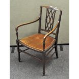 An Edwardian mahogany and satinwood inlaid armchair,