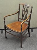 An Edwardian mahogany and satinwood inlaid armchair,