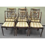 A set of six chairs with upholstered seats, including 2 carvers,