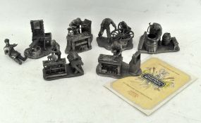 An Evergreen Studio group of figures, including "The Cobbler",