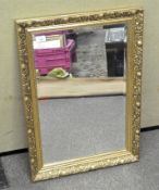 A gilt framed bevelled edged wall mirror,