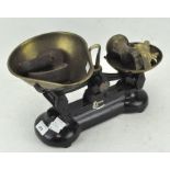 A set of vintage Libra scales, with brass assorted brass bell-shaped weights and Siddons weights,