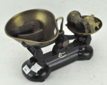 A set of vintage Libra scales, with brass assorted brass bell-shaped weights and Siddons weights,