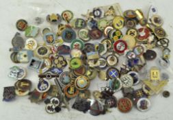 A collection of assorted enamel bowling badges of various designs