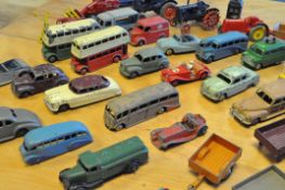 A collection of die cast vehicles including examples by Dinky and Matchbox,