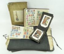 Two vintage stamp albums, a collection of vintage postcards,
