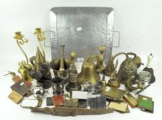 A collection of assorted brass and metal ware, including bells, a pestle and mortar, candlestick,