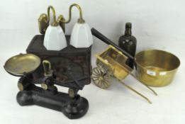 A collection of brassware and other items, including: a skillet, a model of a cart,