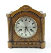 An oak cased Hamburg Clock Company mantel clock,