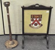 A mahogany framed fire screen with 'Trinity College' tapestry;