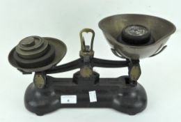 A set of early 20th century Libra brass and cast-iron kitchen scales,