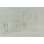 Ten clear and frosted glass oil lamp chimneys,