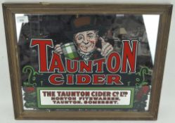 A Taunton Cider advertising mirror, framed,