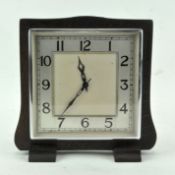 An English (Garrard) clock, mid-20th century, in oak square frame,