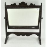 An oak dressing table swing mirror,