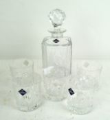 An Edinburgh crystal decanter with five matching tumblers,