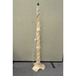 An alabaster standard lamp, of twisting form,