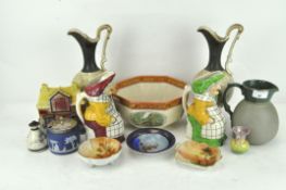 A group of assorted ceramics, including a pair of Toby jugs,