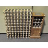 A pine cupboard and a wine wrack, the cupboard 89 cm high x 38 cm wide x 26 cm deep,