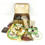 A collection of assorted costume jewellery, including brooches,