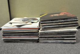 A collection of vintage 1980's vinyl records (1 box)
