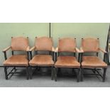 A set of four early 20th century oak chairs, upholstered,