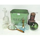 A vintage green enamel bread bin, together with an enamel dressing table mirror,