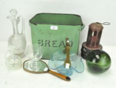 A vintage green enamel bread bin, together with an enamel dressing table mirror,