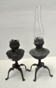 A pair of early 20th century brass oil lamps in the Benson style, one with original glass funnel,