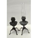 A pair of early 20th century brass oil lamps in the Benson style, one with original glass funnel,