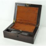 A 19th century rosewood writing slope, with mother of pearl inlay adorning the top,
