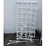 A Victorian white painted cast iron children's cot and base 133 cm x 71 cm