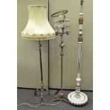 An onyx and gilt standard lamp and two others,