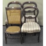 Three Victorian mahogany balloon back dining chairs;