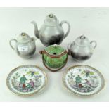 An early 20th century Japanese teapot, milk pot and lidded sugar bowl,