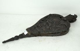 A pair of Arts and Crafts carved oak bellows, carved with foliate designs and the date 1899,