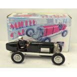 A vintage classic tin plate die cast "Miller" car,