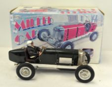 A vintage classic tin plate die cast "Miller" car,