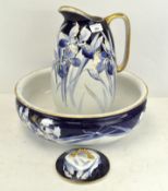 An early 20th century pottery ewer, wash basin and soap dish and cover,