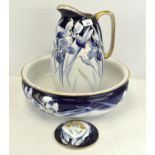 An early 20th century pottery ewer, wash basin and soap dish and cover,