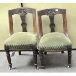 A pair of Victorian dining chairs with green upholstery (2)