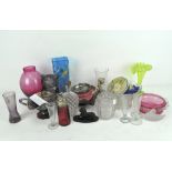 A collection of assorted glass items, including carnival glass, art glass vase,