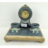 A German pottery clock case by Eichwell, early 20th century, glazed in blue,